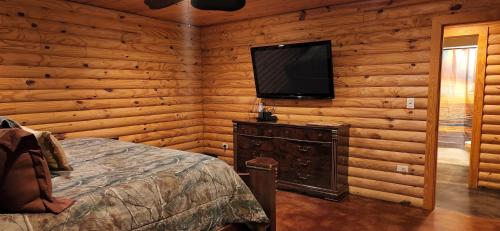 Postel nebo postele na pokoji v ubytování The Lodge Cabin