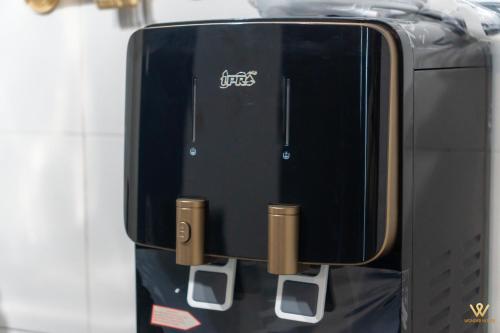 a black suitcase sitting on top of a table at 3BR Serene Stay in North of Petaling Jaya near MRT station in Petaling Jaya
