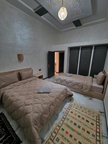 Ein Bett oder Betten in einem Zimmer der Unterkunft Appartement In Ksar Ait Ben Haddou