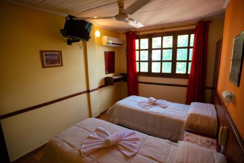 Postel nebo postele na pokoji v ubytování Hosteria Los Helechos