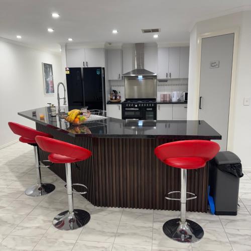 Una cocina o cocineta en Mahzan on Braid Room 2