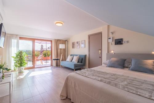 Ένα ή περισσότερα κρεβάτια σε δωμάτιο στο Luxury Maison Dei Colli