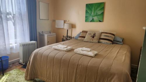 Postel nebo postele na pokoji v ubytování Fairlie Hotel