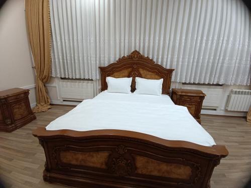 Ένα ή περισσότερα κρεβάτια σε δωμάτιο στο MIMFRI PREMIUM guest house, hotel