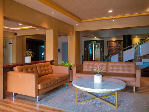 Χώρος καθιστικού στο Hotel Nirwana Pekalongan