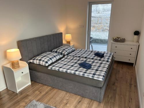 Postel nebo postele na pokoji v ubytování Apartmánový dom Panoráma Park Vlková