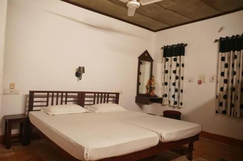 Postel nebo postele na pokoji v ubytování White Saand Beach Residence