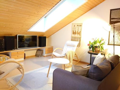 Ruang duduk di Holidayhome TahkonTintinlenkki