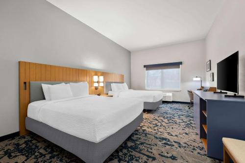 Postel nebo postele na pokoji v ubytování Country Inn & Suites by Radisson, LSU - Medical Corridor