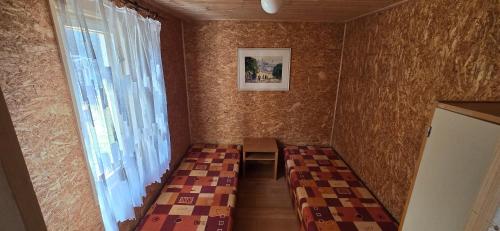 Postel nebo postele na pokoji v ubytování Wodolenka