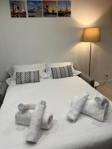 Llit o llits en una habitació de Superb Studio with Eiffel Tower View