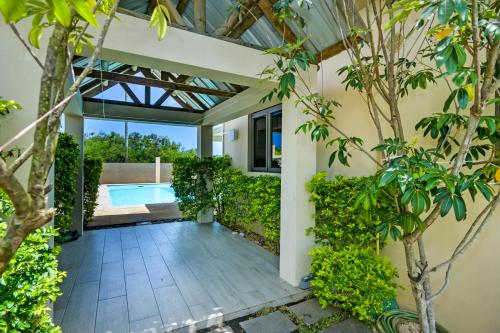 Πισίνα στο ή κοντά στο Villa Les Cocotiers by Oceanaxe Holidays