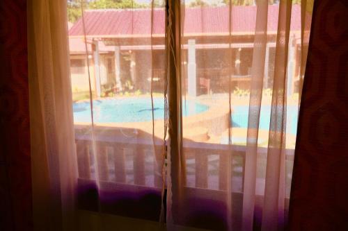 Bazén v ubytování CHIISAI NATSU RESORT nebo v jeho okolí