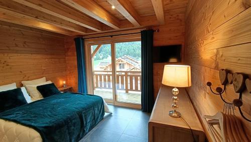Postel nebo postele na pokoji v ubytování Chalet la Cime