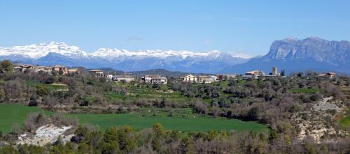 an aerial view of a resort with mountains in the background at Casa Alegría de Lamata in Lamata