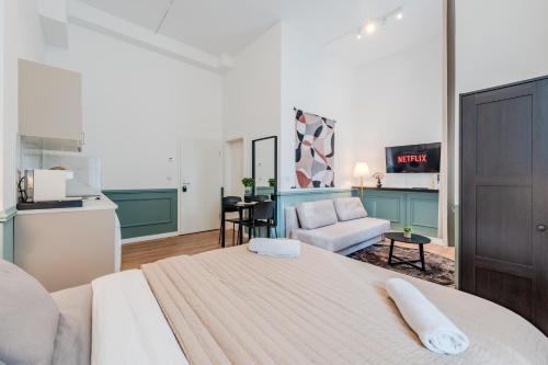 Postel nebo postele na pokoji v ubytování Prenzlauer Pearl Luxury Suite