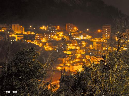 a city lit up at night with lights at 牛角一邊厝 in Nangan