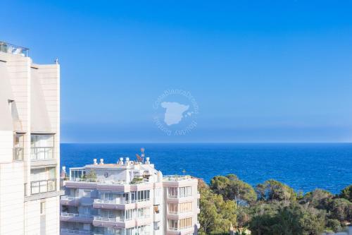 a view of the ocean from a building at CostaBlancaDreams Calpe Beach 2 6O in Calpe in Calpe