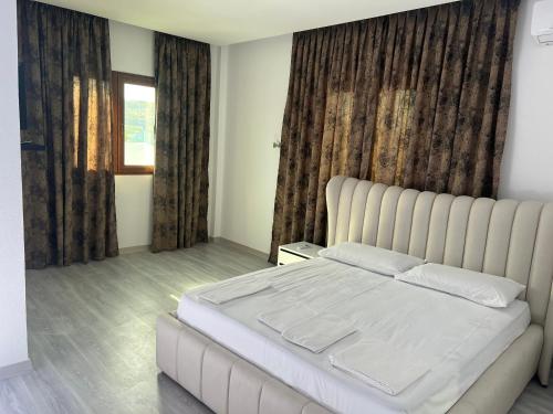 Postel nebo postele na pokoji v ubytování Hotel Veranda
