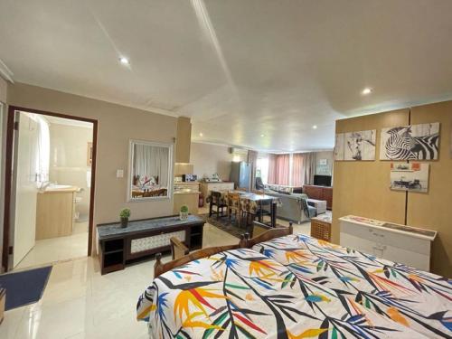 Ένα ή περισσότερα κρεβάτια σε δωμάτιο στο Marshrose Accommodation