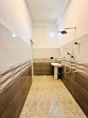 Un baño de Garden Beach Hotel