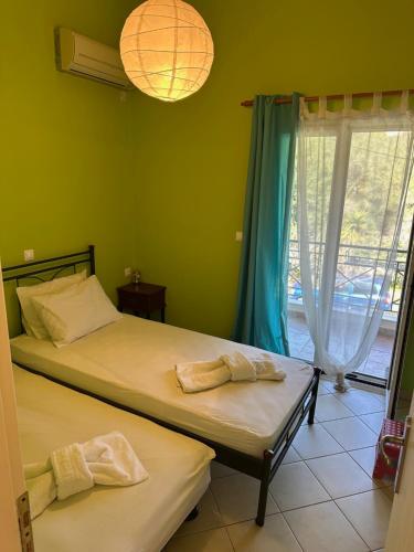 Llit o llits en una habitació de Villa Golden