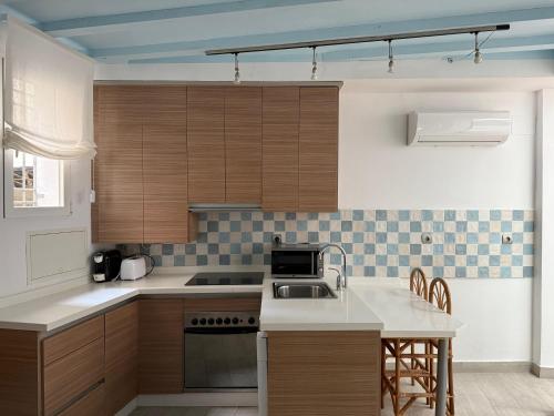 Η κουζίνα ή μικρή κουζίνα στο Casa Duplex en centro granada- Parking Opcional