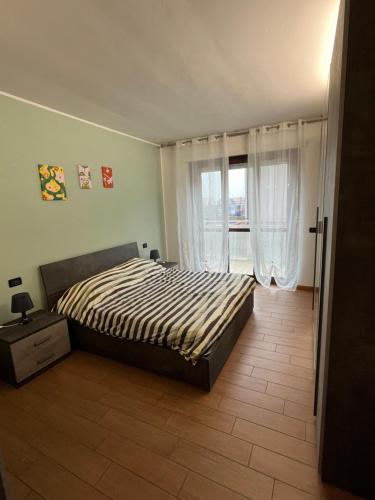 Postel nebo postele na pokoji v ubytování Casa Laetitia