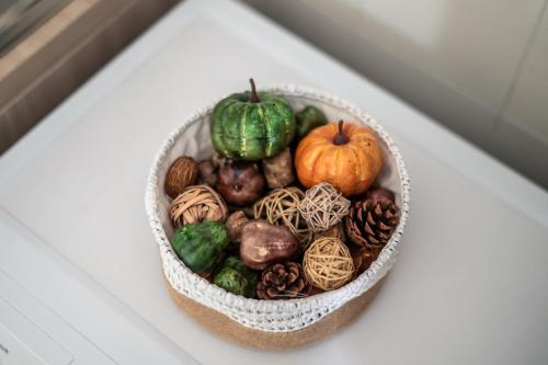 a basket filled with different types of fruits and vegetables at casa stefano in Piumarola