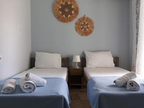 Ένα ή περισσότερα κρεβάτια σε δωμάτιο στο Vassia's B rooms