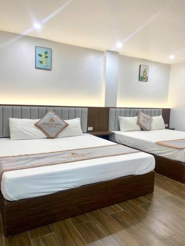 Postel nebo postele na pokoji v ubytování Thuỷ Anh Hotel
