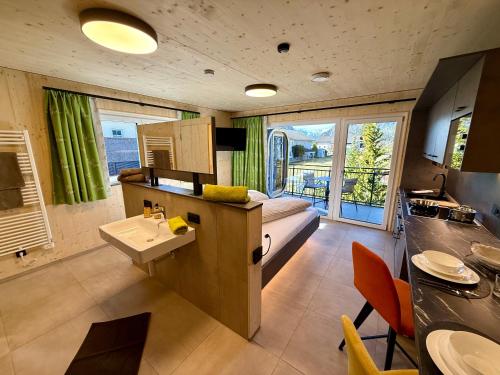 Posezení v ubytování TinyHome Singer - inclusive private Sauna