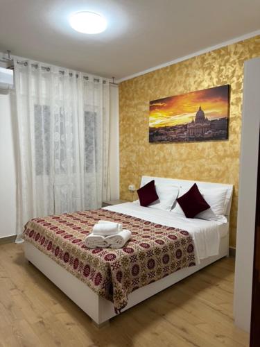a bedroom with a bed with a phone on it at Ca Felisati Venice in Mestre