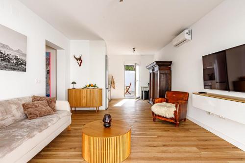 a living room with a couch and a coffee table at Albir Casa Marleen in Albir