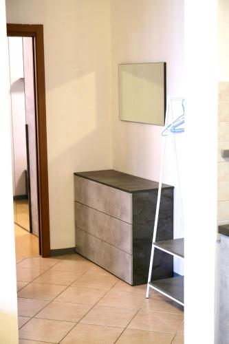 TV a/nebo společenská místnost v ubytování Casa Segantini - Relax Patio Apartment 1