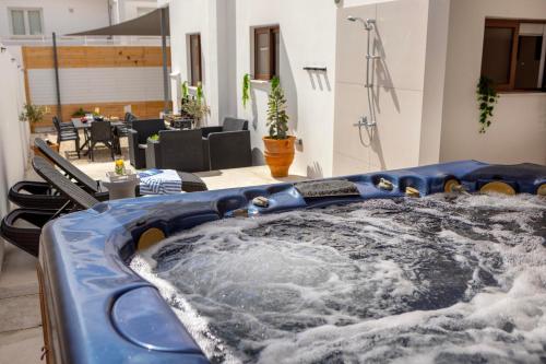 Zona de estar de SEVIS SUITES