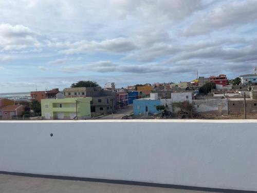 a view of a city from the top of a building at Casa Tubarào in Vila do Maio