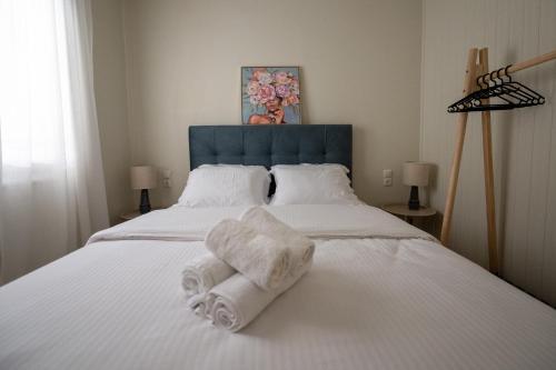 Postel nebo postele na pokoji v ubytování Tsagris Guest House