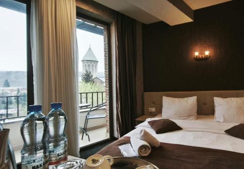 Postel nebo postele na pokoji v ubytování Hotel Voyager