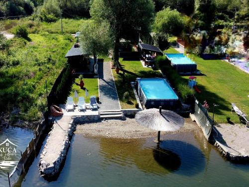 an overhead view of a beach with an umbrella at Kuca za odmor Stakic in Zvornik