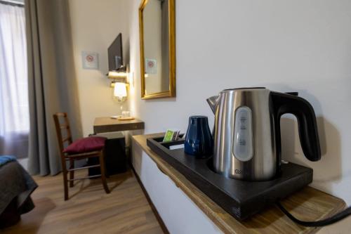 a coffee maker on a counter in a room at B&B Domus Enna in Enna