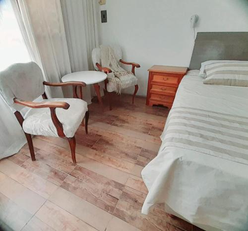 Postel nebo postele na pokoji v ubytování DPTO CASA EN EL CENTRO p1
