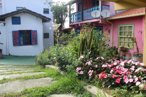 Taman di luar Pousada Aconchego da Valdirene