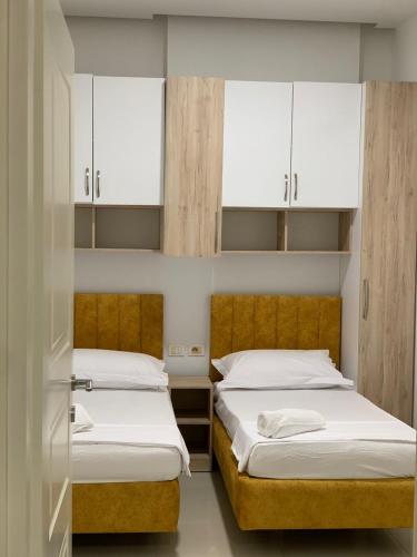 Postel nebo postele na pokoji v ubytování Apartament Joni