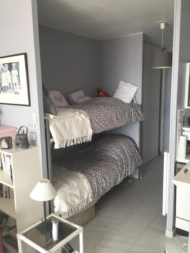 Postel nebo postele na pokoji v ubytování Studio Residence Les Algues - Place Foch