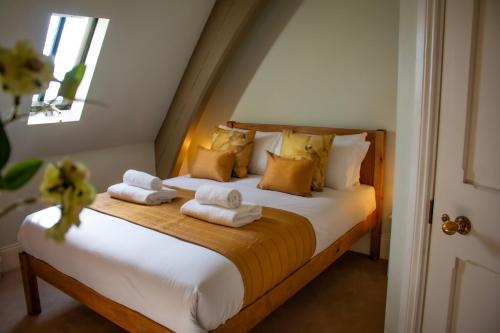 Letto o letti in una camera di The Old Palace Lodge