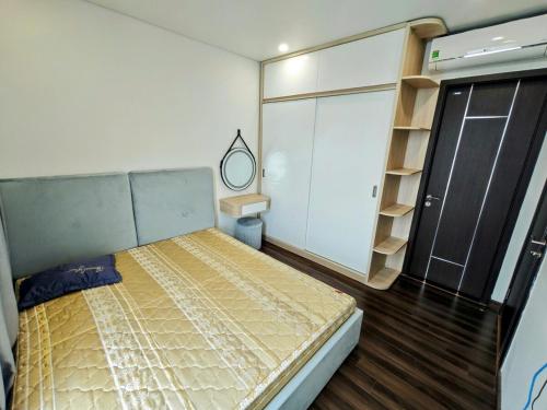 Postel nebo postele na pokoji v ubytování Ấm cúng, hiện đại, tiện nghi 4!