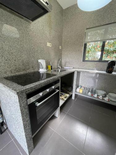 Η κουζίνα ή μικρή κουζίνα στο Quinta Do Padrao