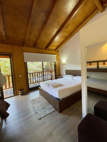 Ένα ή περισσότερα κρεβάτια σε δωμάτιο στο Quinta Do Padrao