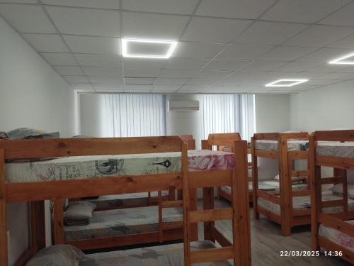 a group of bunk beds in a room at Aydeniz hostel in Chişinău